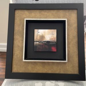 Print with 3 d effect. Great accent to any room. Black frame tan and red color